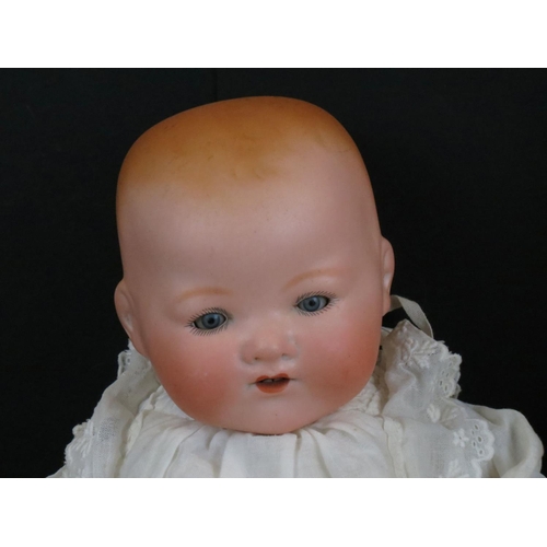 499 - Two Armand Marseille bisque headed baby dolls to include sleeping blue glass eyes, teeth, finger wea... 