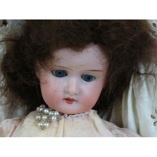 500 - Four early 20th C bisque headed dolls to include Halbig marked K & R, Knauth, etc, showing some wear