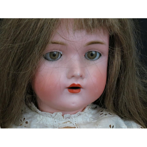 500 - Four early 20th C bisque headed dolls to include Halbig marked K & R, Knauth, etc, showing some wear