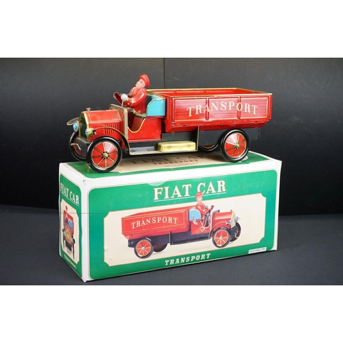 506 - Six boxed tinplate model vehicles, to include W E Ladder Fire Engine, Fiat Car Transport truck, Grea... 