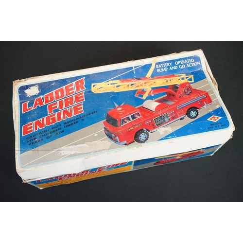 506 - Six boxed tinplate model vehicles, to include W E Ladder Fire Engine, Fiat Car Transport truck, Grea... 