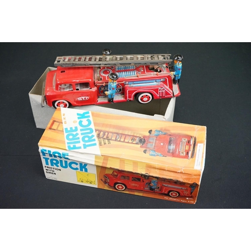 506 - Six boxed tinplate model vehicles, to include W E Ladder Fire Engine, Fiat Car Transport truck, Grea... 