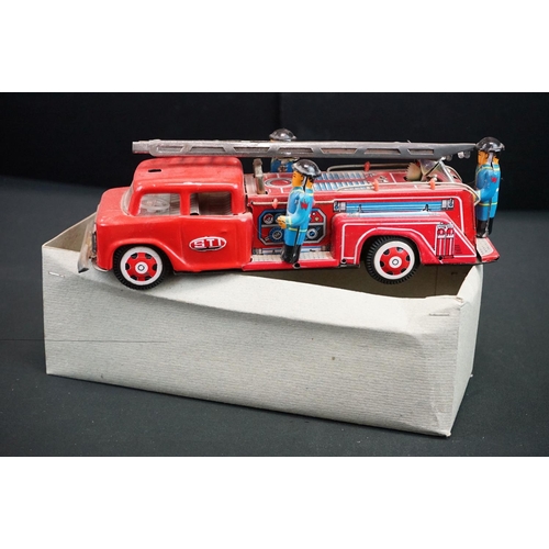 506 - Six boxed tinplate model vehicles, to include W E Ladder Fire Engine, Fiat Car Transport truck, Grea... 