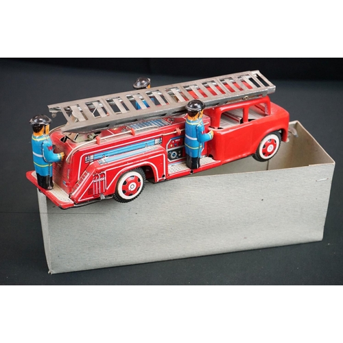 506 - Six boxed tinplate model vehicles, to include W E Ladder Fire Engine, Fiat Car Transport truck, Grea... 