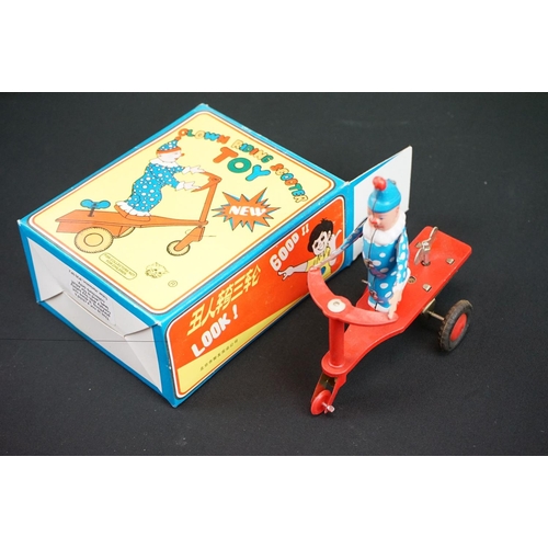 507 - Group of seven boxed tinplate toys, to include Monkey On A Tricycle, Ice Cream Vender, Clown Drummer... 