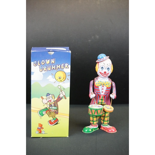 507 - Group of seven boxed tinplate toys, to include Monkey On A Tricycle, Ice Cream Vender, Clown Drummer... 