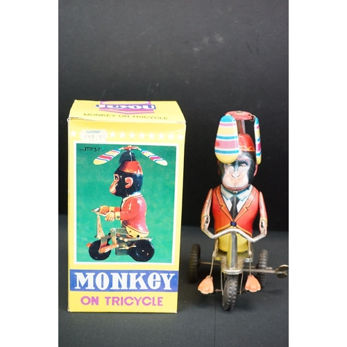 507 - Group of seven boxed tinplate toys, to include Monkey On A Tricycle, Ice Cream Vender, Clown Drummer... 