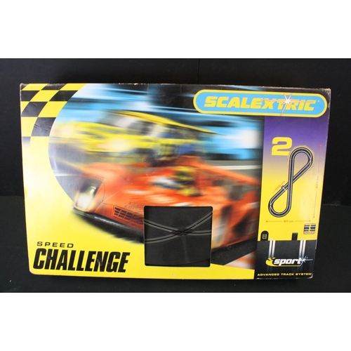 1303 - Three boxed Scalextric 2 Speed Challenge sets, all with slot cars, to include TVR, Renault Megane & ... 