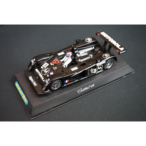 1306 - Five cased Scalextric slot cars to include Cadillac 2000 LMP, Audi R8, TVR Speed 12, Jaguar Racing F... 