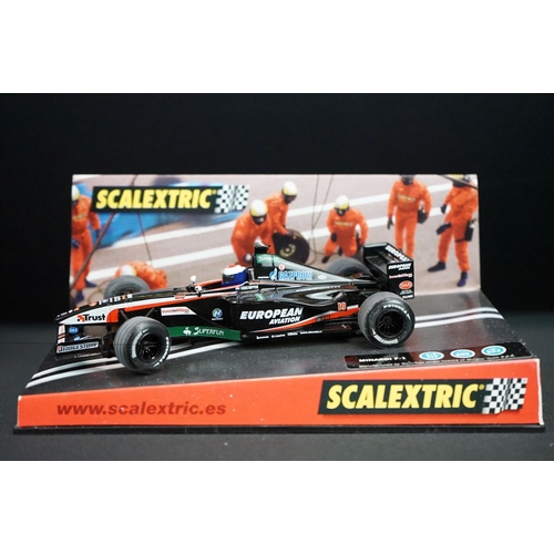 1306 - Five cased Scalextric slot cars to include Cadillac 2000 LMP, Audi R8, TVR Speed 12, Jaguar Racing F... 