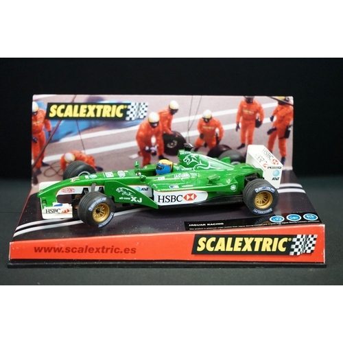 1306 - Five cased Scalextric slot cars to include Cadillac 2000 LMP, Audi R8, TVR Speed 12, Jaguar Racing F... 