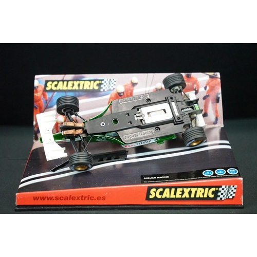 1306 - Five cased Scalextric slot cars to include Cadillac 2000 LMP, Audi R8, TVR Speed 12, Jaguar Racing F... 