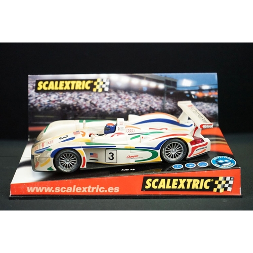 1306 - Five cased Scalextric slot cars to include Cadillac 2000 LMP, Audi R8, TVR Speed 12, Jaguar Racing F... 