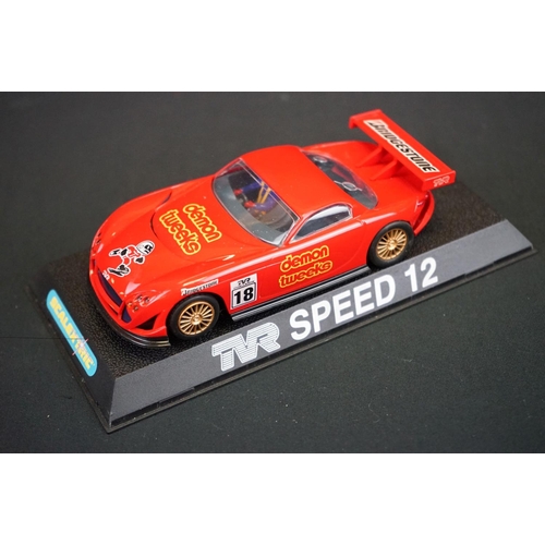 1306 - Five cased Scalextric slot cars to include Cadillac 2000 LMP, Audi R8, TVR Speed 12, Jaguar Racing F... 