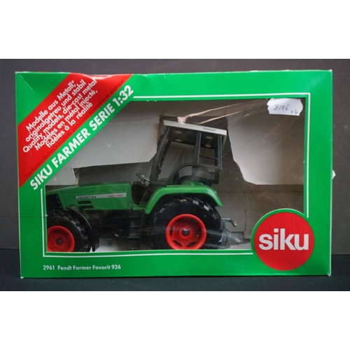 1311 - Four Boxed diecast 1/32 scale model tractors, some incorrect boxes, to include 2 x Britains (Fendt 6... 