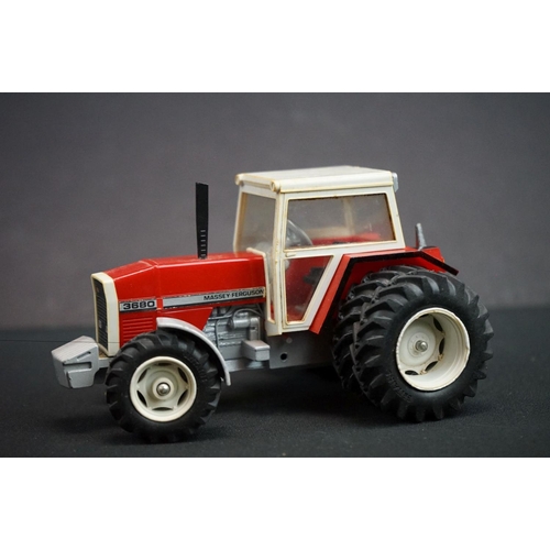 1311 - Four Boxed diecast 1/32 scale model tractors, some incorrect boxes, to include 2 x Britains (Fendt 6... 