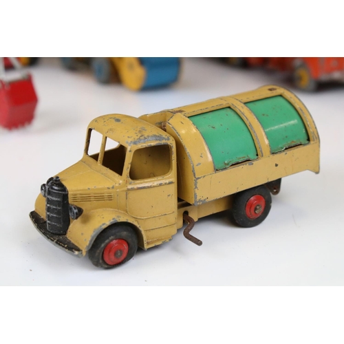 1391 - Eight mid 20th C play worn construction and commercial diecast models to include Dinky & Corgi examp... 