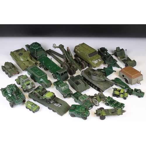 1392 - Around 45 mid 20th C onwards play worn diecast military models to include Dinky, Lone Star, Britains... 