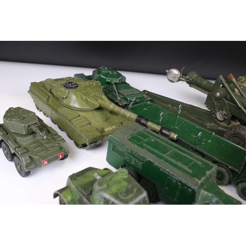 1392 - Around 45 mid 20th C onwards play worn diecast military models to include Dinky, Lone Star, Britains... 