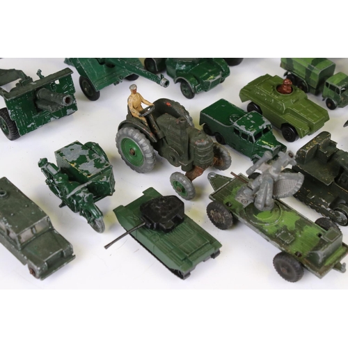 1392 - Around 45 mid 20th C onwards play worn diecast military models to include Dinky, Lone Star, Britains... 