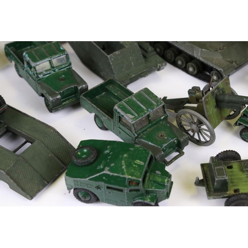 1392 - Around 45 mid 20th C onwards play worn diecast military models to include Dinky, Lone Star, Britains... 