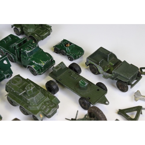 1392 - Around 45 mid 20th C onwards play worn diecast military models to include Dinky, Lone Star, Britains... 