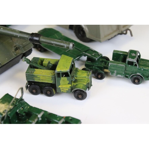 1392 - Around 45 mid 20th C onwards play worn diecast military models to include Dinky, Lone Star, Britains... 