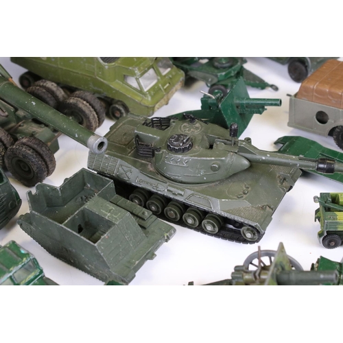 1392 - Around 45 mid 20th C onwards play worn diecast military models to include Dinky, Lone Star, Britains... 