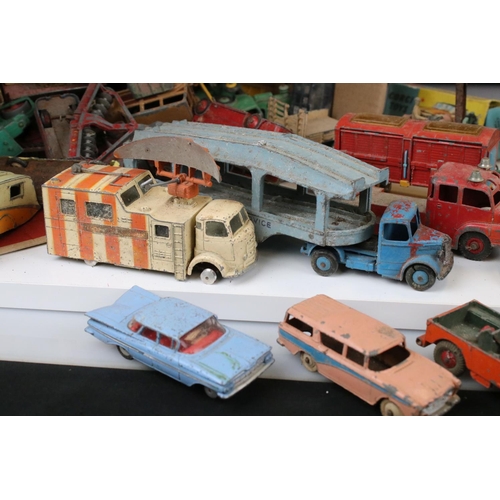 1394 - Collection of heavily play worn mid 20th C Dinky & Corgi diecast models to include commercials, road... 