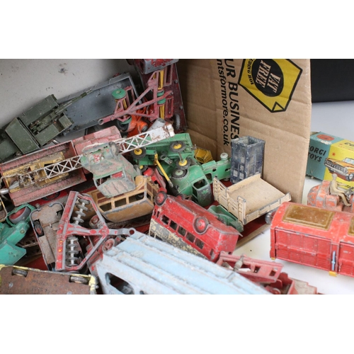 1394 - Collection of heavily play worn mid 20th C Dinky & Corgi diecast models to include commercials, road... 