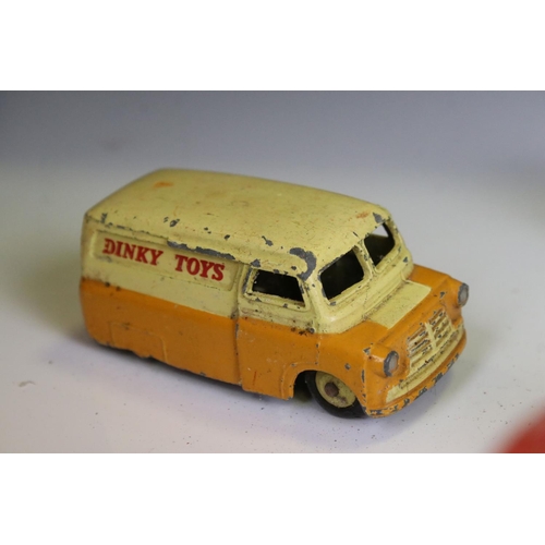 1394 - Collection of heavily play worn mid 20th C Dinky & Corgi diecast models to include commercials, road... 