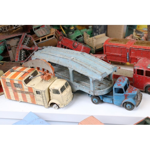 1394 - Collection of heavily play worn mid 20th C Dinky & Corgi diecast models to include commercials, road... 