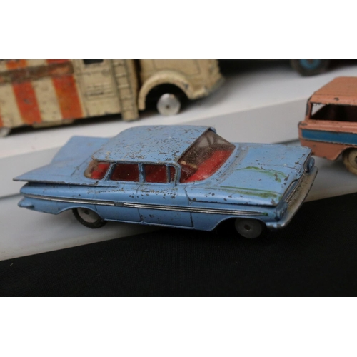 1394 - Collection of heavily play worn mid 20th C Dinky & Corgi diecast models to include commercials, road... 