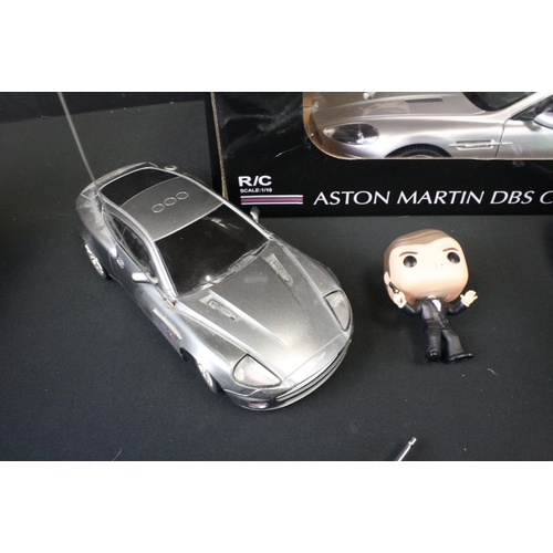 425 - Collection of James Bond related figures & radio control vehicles to include boxed Radstar Aston Mar... 