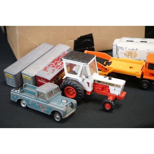 1312 - Around 60 mid 20th C onwards play worn diecast models to include Dinky, Corgi, Matchbox, Husky and T... 