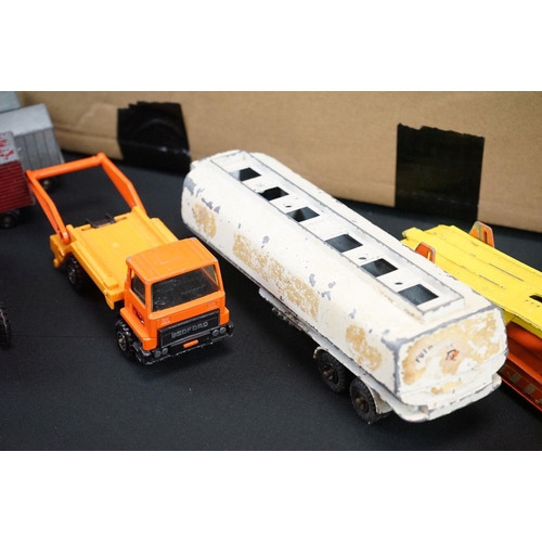 1312 - Around 60 mid 20th C onwards play worn diecast models to include Dinky, Corgi, Matchbox, Husky and T... 