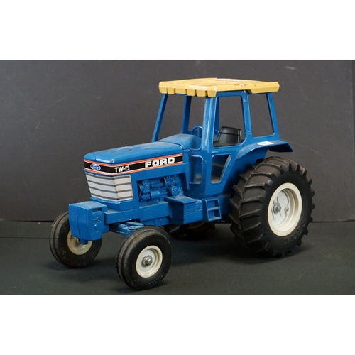 1313 - ERTL Ford TW-5 diecast tractor model (missing exhaust), plus an ERTL International diecast & plastic... 