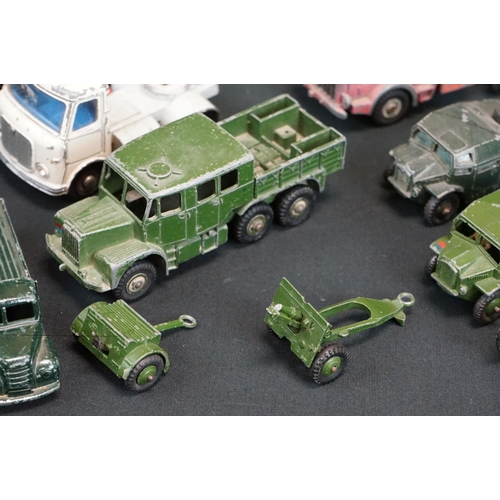 1319 - 23 mid 20th C play worn diecast models, mostly Dinky, to include Dinky 422 Fordson, Dinky Supertoys ... 