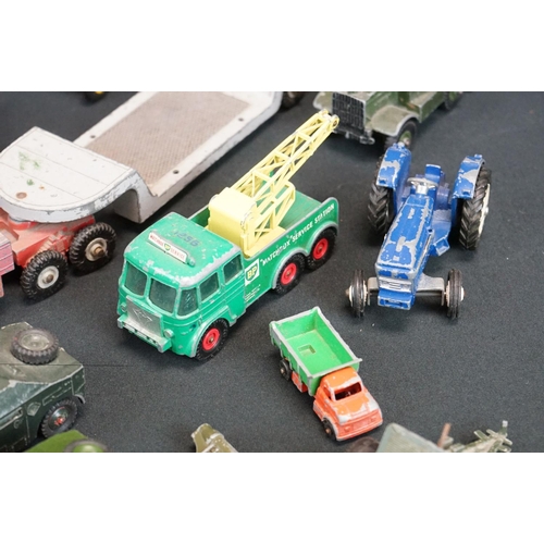 1319 - 23 mid 20th C play worn diecast models, mostly Dinky, to include Dinky 422 Fordson, Dinky Supertoys ... 