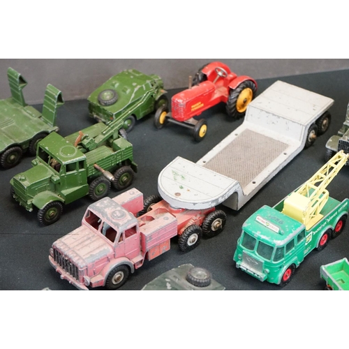 1319 - 23 mid 20th C play worn diecast models, mostly Dinky, to include Dinky 422 Fordson, Dinky Supertoys ... 