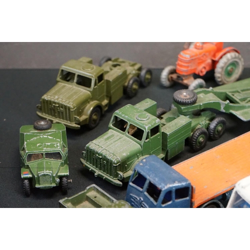 1319 - 23 mid 20th C play worn diecast models, mostly Dinky, to include Dinky 422 Fordson, Dinky Supertoys ... 