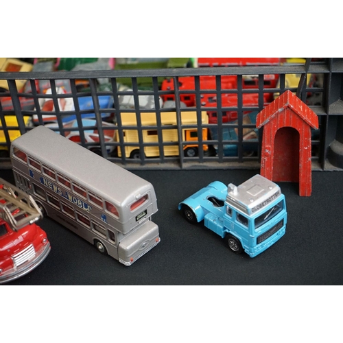 1395 - Over 65 mid 20th C onwards play worn diecast models to include Dinky, Corgi, Matchbox, etc, featurin... 