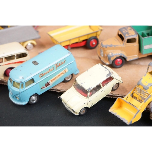 1396 - Over 40 mid 20th C play worn diecast models to include Dinky & Corgi examples featuring road, farmin... 