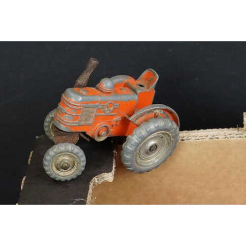 1396 - Over 40 mid 20th C play worn diecast models to include Dinky & Corgi examples featuring road, farmin... 