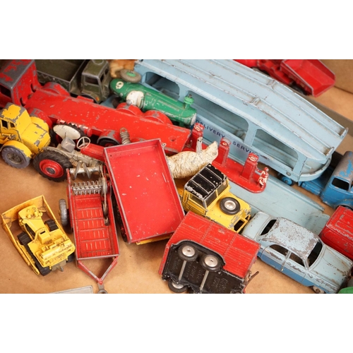 1396 - Over 40 mid 20th C play worn diecast models to include Dinky & Corgi examples featuring road, farmin... 