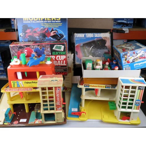 417 - Group of mixed vintage toys to include 2 x Fisher Price garages, boxed Tomy Super Cup Football, boxe... 