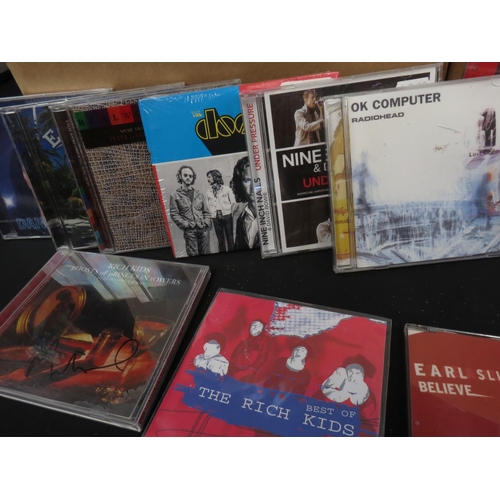 363 - CDs - Around 300 various CDs featuring signed examples, spanning the genres, artists includeElvis Co... 