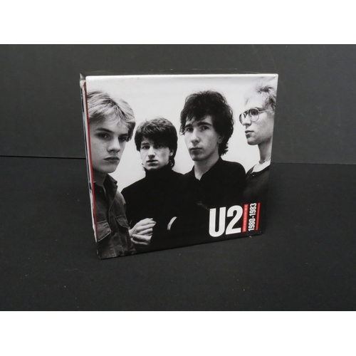 373 - CDs - U2 ltd edn Collectors Box Set 1980-1983, complete with button badges