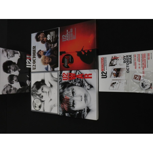 373 - CDs - U2 ltd edn Collectors Box Set 1980-1983, complete with button badges