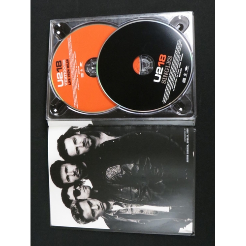 387 - Music Autograph - U2 18 Singles Box Set signed to the cover by 3 of the band including Bono & Edge, ... 